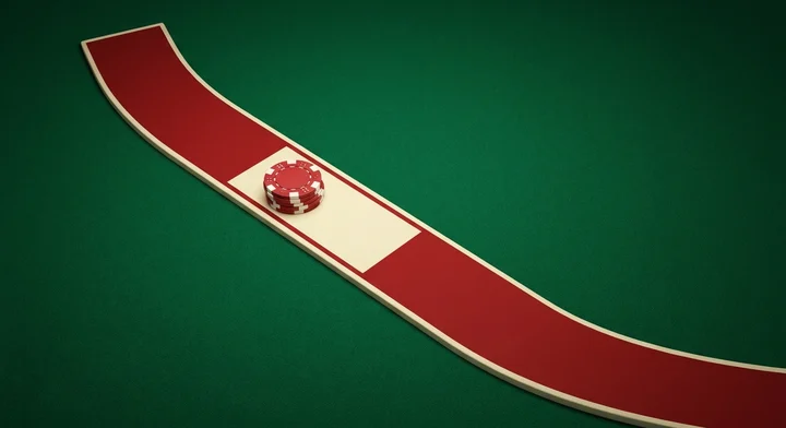 Chips placed on the pass line of a craps layout - how to play Simplified Craps